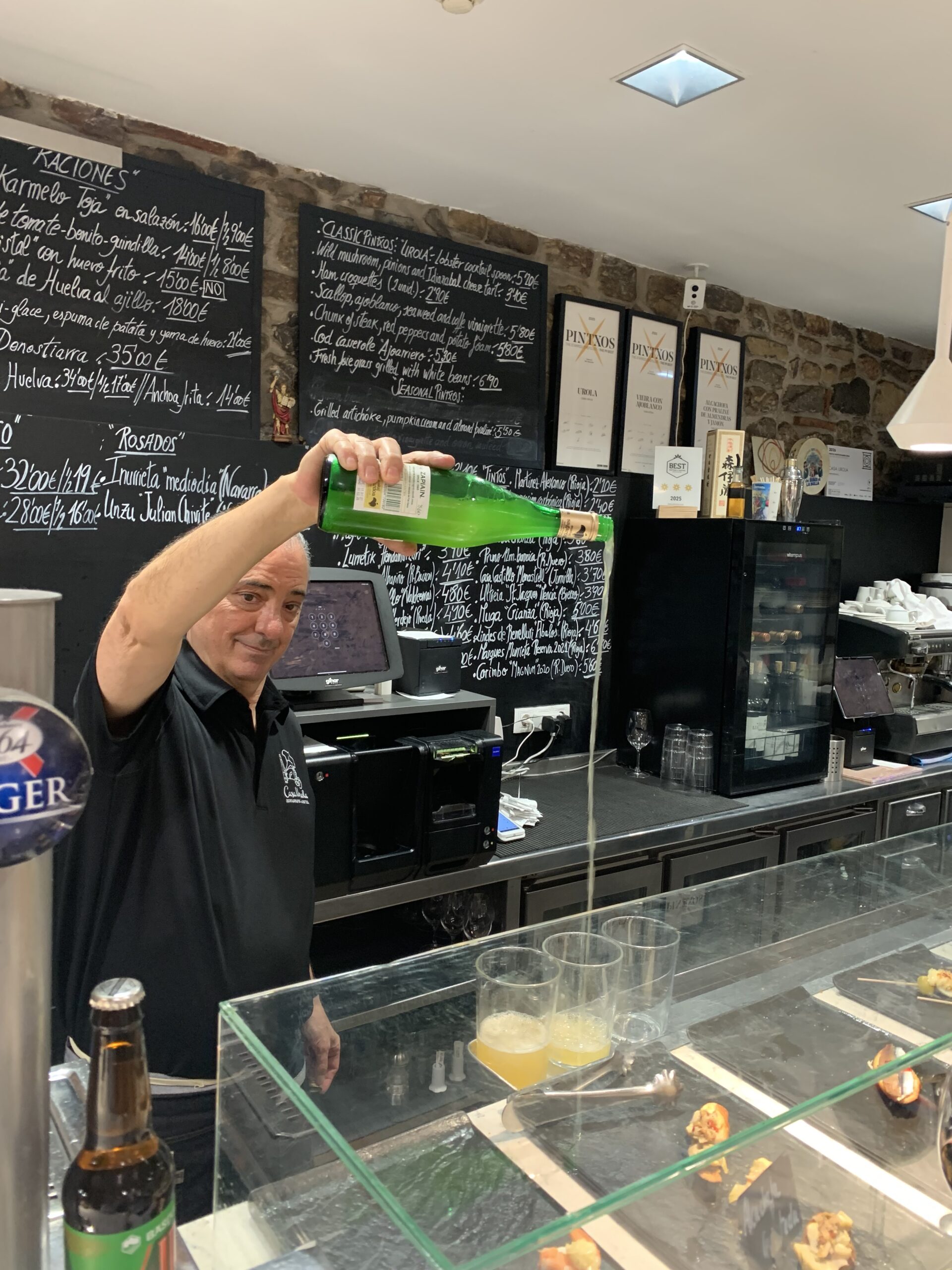 Cider being poured in Donostia
